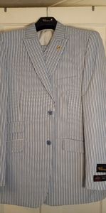 Suit with pants and vest.